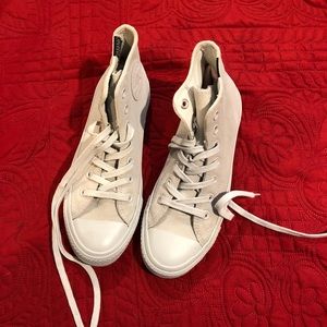 White leather high top Converse shoes